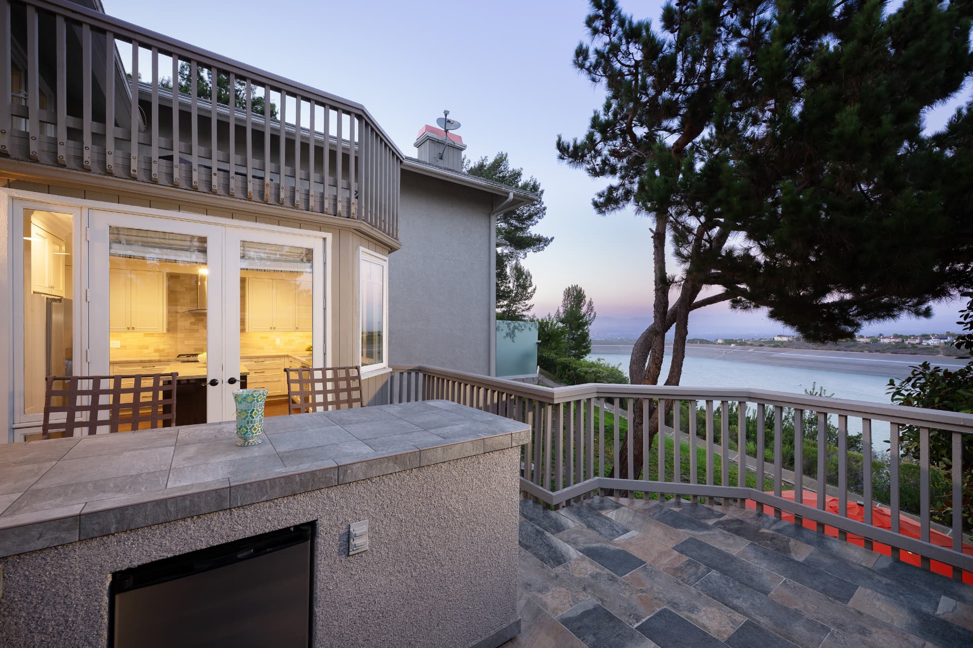 Upper deck with reservoir view, built-in BBQ, and outdoor dining